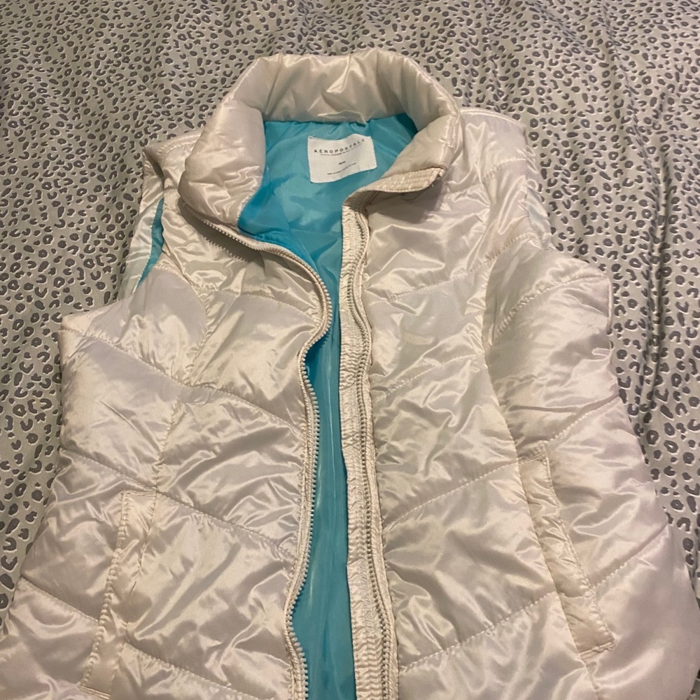 Puffy vest.